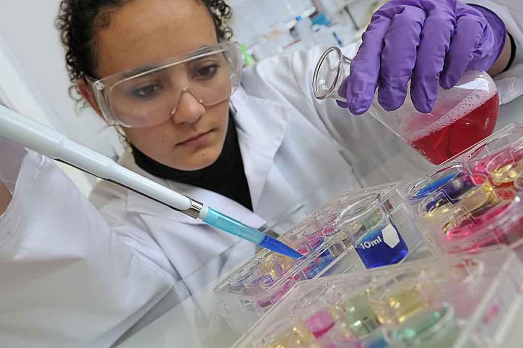 Life sciences image chemist working with chemicals